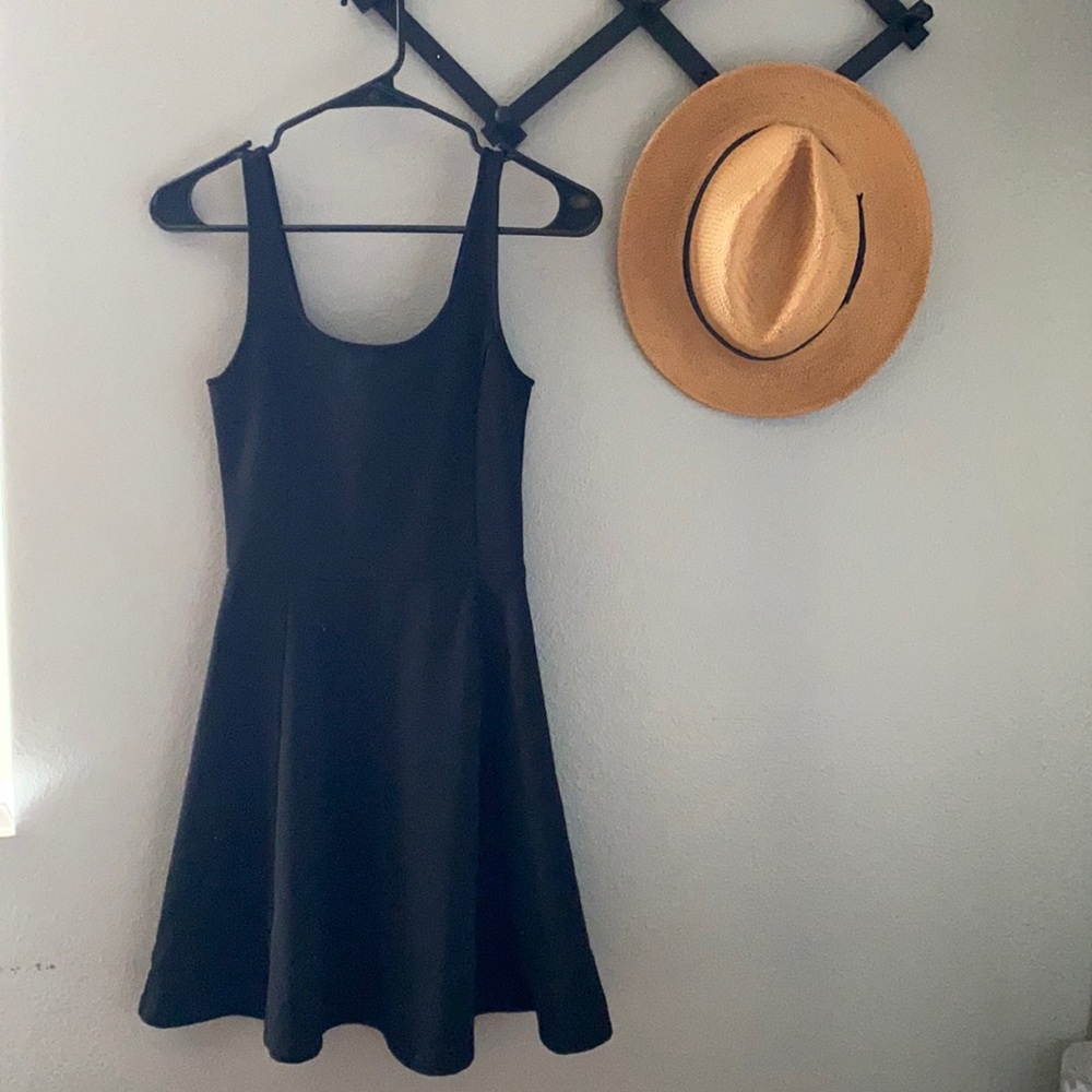 Divided by H & M. Solid black short dress in a size 6.